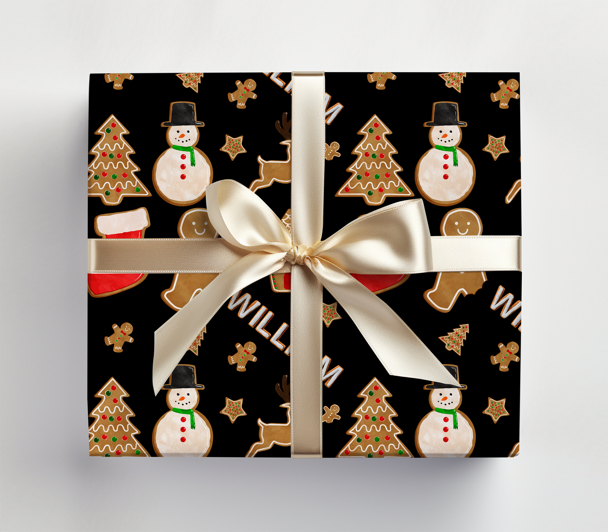 a present wrapped in a black wrapping paper with snowmen and christmas trees
