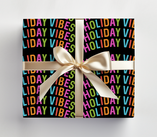 a black box with a white ribbon and a white bow