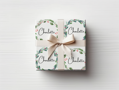 a gift wrapped in white paper with a bow