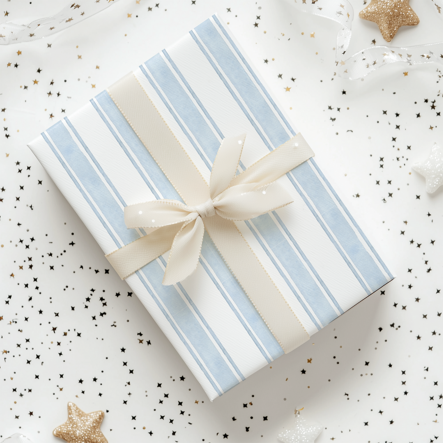 a blue and white gift box with a bow