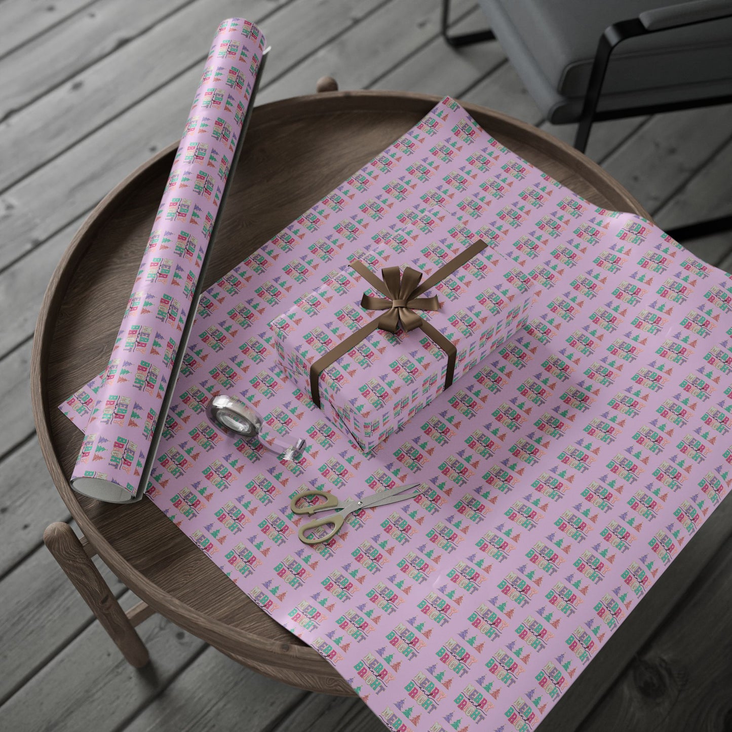 a table topped with a wrapped present and a pair of scissors