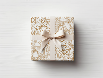 a wrapped gift box with a bow on top of it