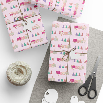 a table topped with wrapping paper and scissors