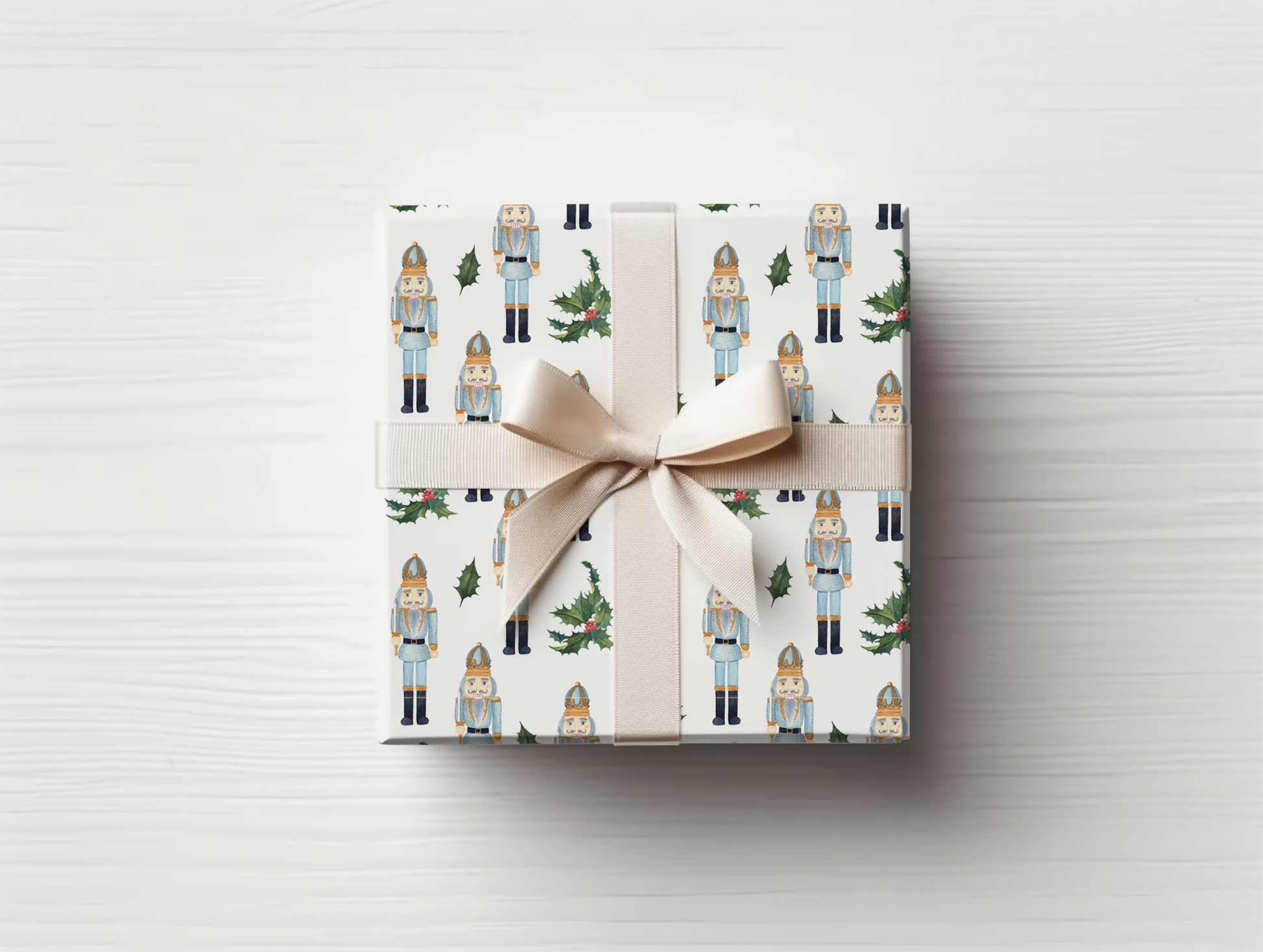 a wrapped present with a bow on a white table