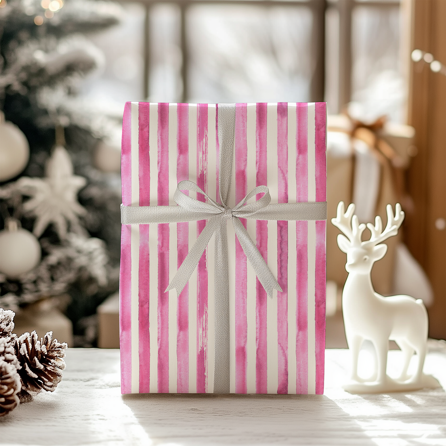 a present wrapped in pink and white striped paper