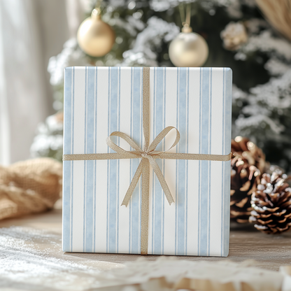 a blue and white striped gift box with a bow