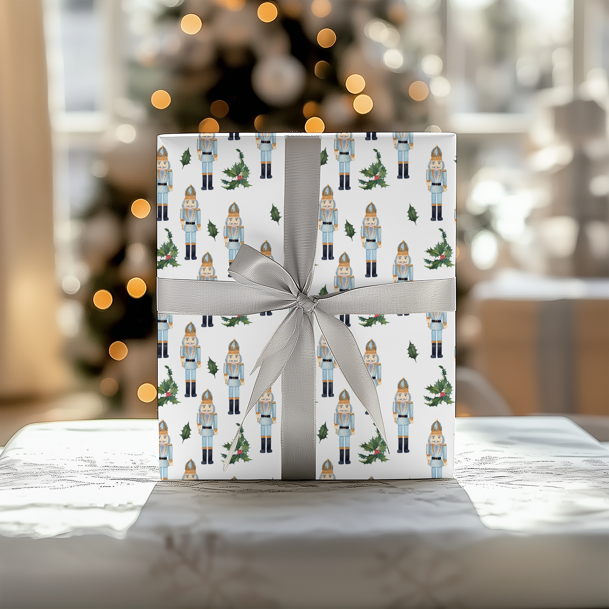 a present wrapped in white paper with a christmas tree in the background