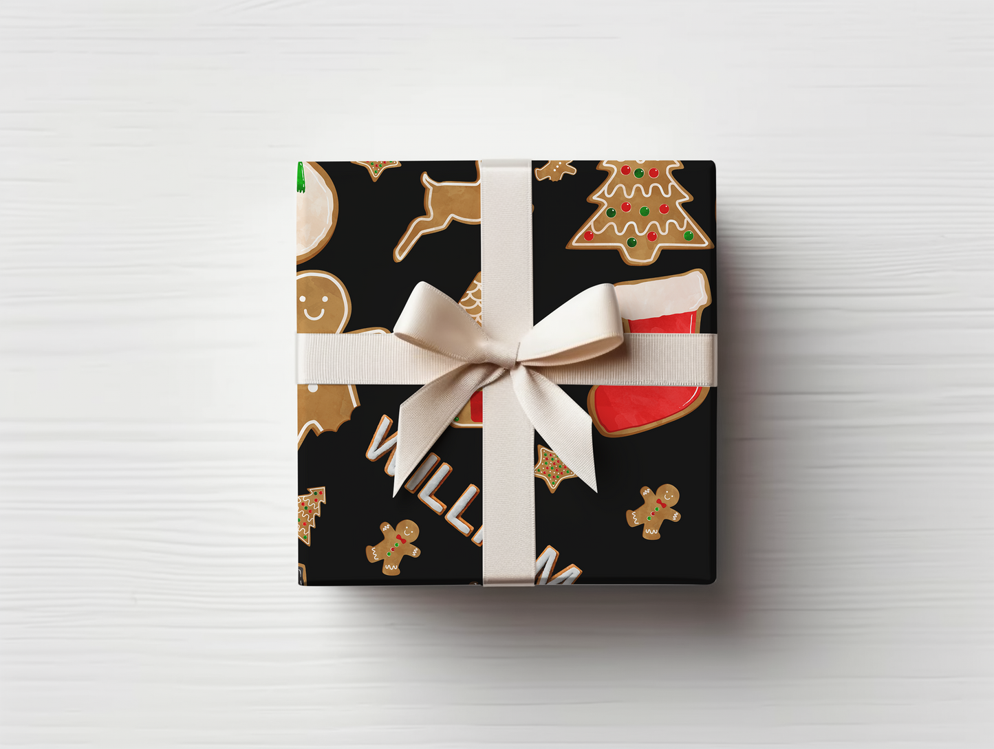 a present wrapped in a black wrapping paper with a white ribbon