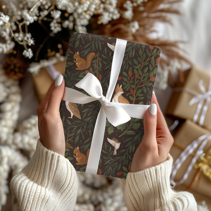a woman holding a gift box with a white ribbon