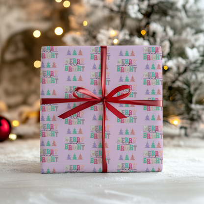 a present wrapped in pink paper with a red ribbon