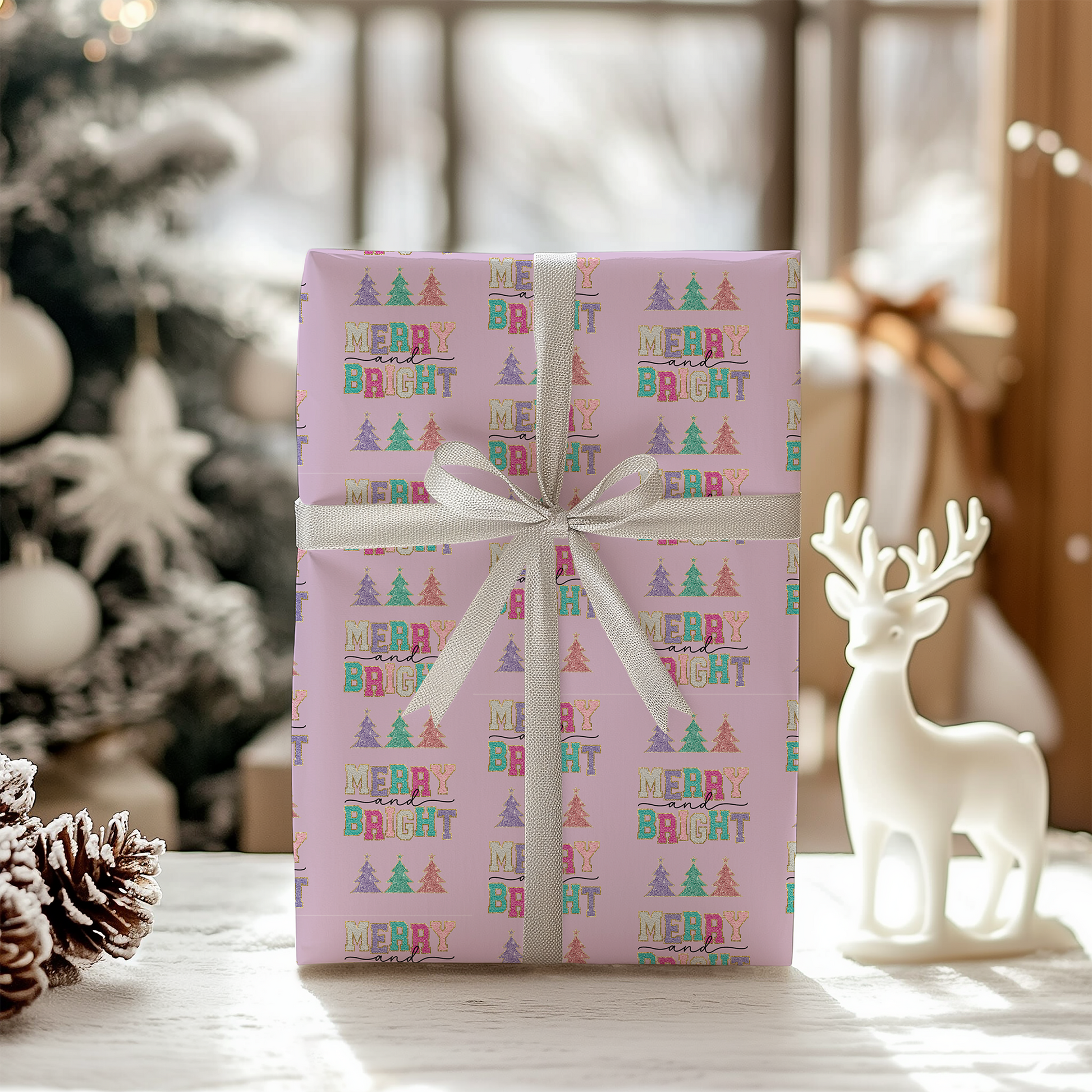 a present wrapped in pink paper with a white ribbon