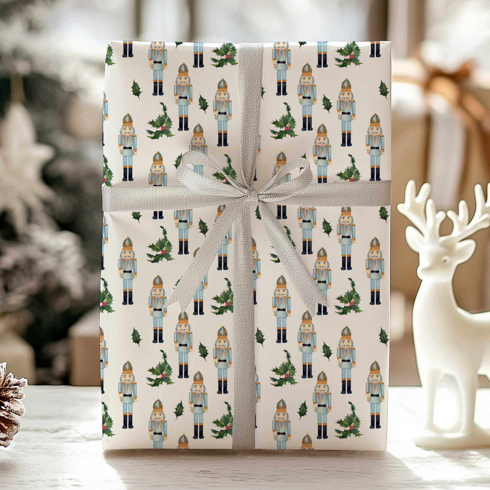 a present wrapped in white paper with a reindeer figurine next to it