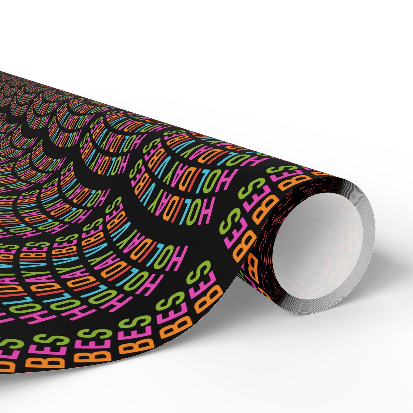 a roll of black wrapping paper with multicolored letters on it