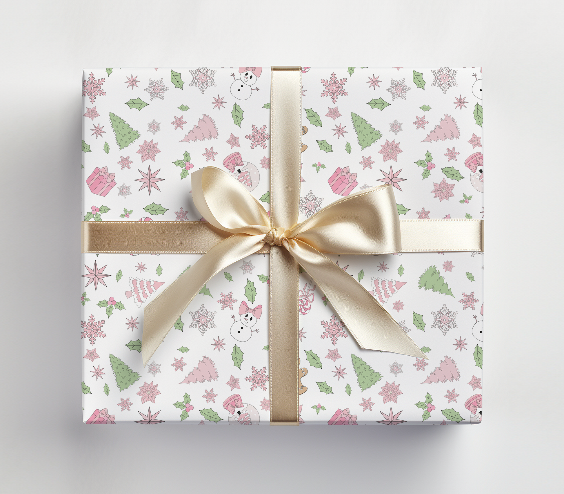 a wrapped gift box with a gold ribbon