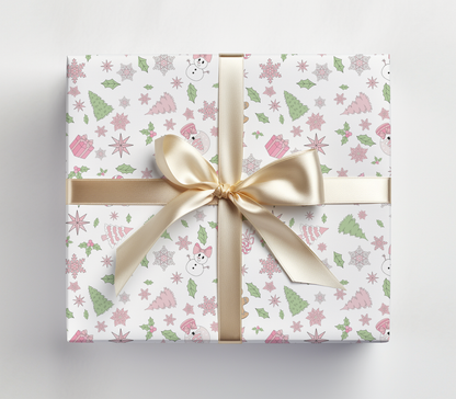 a wrapped gift box with a gold ribbon