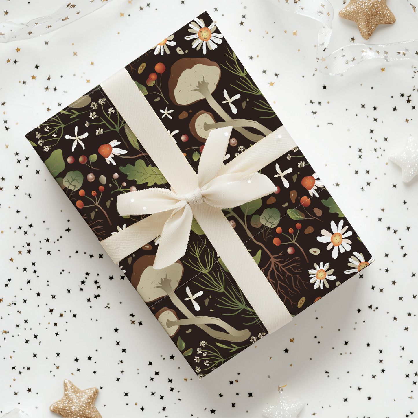 a gift wrapped in black and white paper with a white ribbon