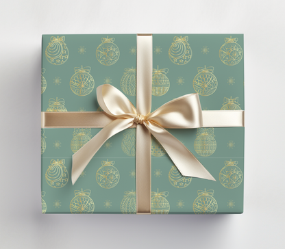 a present wrapped in a green wrapping paper with a gold bow